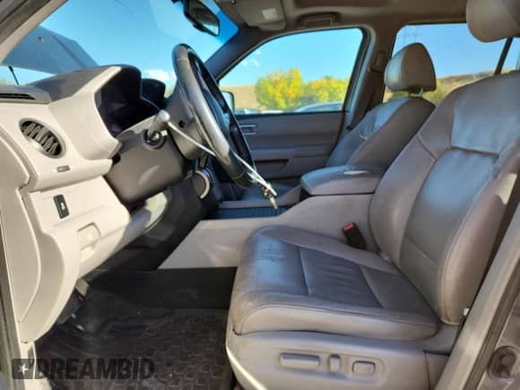 2014 Honda Pilot EX-L z VIN 5FNYF4H55EB054900, wystawiony jako Copart lot #82346645 z przebiegiem 158 454 mil mil oraz Szkoda całkowita • Salvage title. Historia ofert i sprzedaży dostępna na DreamBid. Obrazek 7.