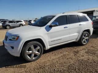 2016 Jeep Grand Cherokee Overland with VIN 1C4RJFCG4GC330314, listed as a Copart auction lot 84763365 with 155,992 mi miles and Salvage title. Bid and sale history available at DreamBid. Image 1.