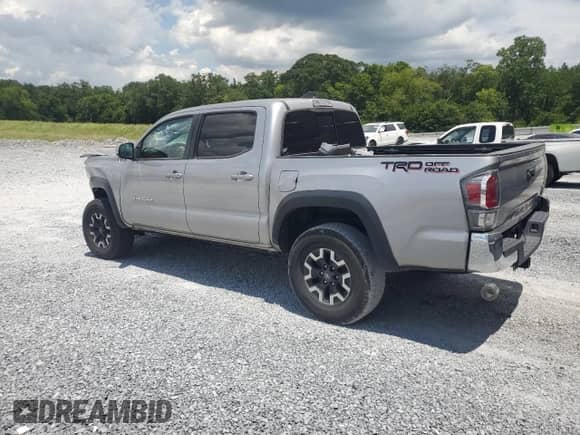 2020 Toyota Tacoma SR5 с VIN 5TFAZ5CN1LX090978, выставлен на аукционе Copart как лот 64010265 с пробегом 117 433 миль миль и Списание • Salvage title. История ставок и продаж доступна на DreamBid. Изображение 2.