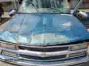 1998 Chevrolet Silverado 1500 z VIN 2GCEC19R8W1242262, wystawiony jako Copart lot #68157345 z przebiegiem 142 051 mil mil oraz Szkoda całkowita • Salvage title. Historia ofert i sprzedaży dostępna na DreamBid. Obrazek 12.