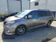 2015 Toyota Sienna SE with VIN 5TDXK3DC6FS622851, listed as a Copart auction lot 82207425 with 112,162 mi miles and Salvage title. Bid and sale history available at DreamBid. Image 1.