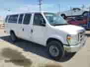 2014 Ford Econoline Cargo Commercial with VIN 1FTNS2EWXEDA67844, listed as a Copart auction lot 57559275 with 140,027 mi miles and Salvage title. Bid and sale history available at DreamBid. Image 4.