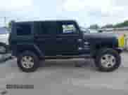 2007 Jeep Wrangler Unlimited Sahara z VIN 1J8GA59187L104774, wystawiony jako IAAI lot #42485359 z przebiegiem 192 254 mil mil oraz . Historia ofert i sprzedaży dostępna na DreamBid. Obrazek 14.