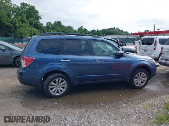 2012 Subaru Forester X Premium z VIN JF2SHADC5CH412689, wystawiony jako IAAI lot #42771071 z przebiegiem 143 409 mil mil oraz . Historia ofert i sprzedaży dostępna na DreamBid. Obrazek 13.