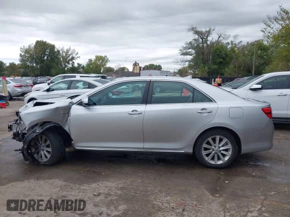 2013 Toyota Camry LE z VIN 4T1BD1FK2DU069763, wystawiony jako IAAI lot #43414989 z przebiegiem 70 738 mil mil oraz . Historia ofert i sprzedaży dostępna na DreamBid. Obrazek 14.