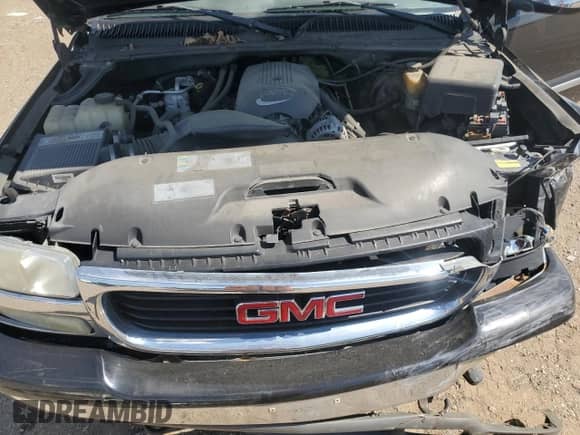 2002 GMC Sierra 1500 SLE with VIN 2GTEK19T721204899, listed as a Copart auction lot 70767695 with Not provided miles and Salvage title. Bid and sale history available at DreamBid. Image 11.