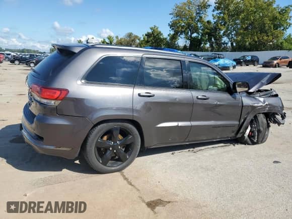 2015 Jeep Grand Cherokee High Altitude z VIN 1C4RJFCT2FC130978, wystawiony jako Copart lot #70140085 z przebiegiem Nie podano mil oraz Szkoda całkowita • Salvage title. Historia ofert i sprzedaży dostępna na DreamBid. Obrazek 3.