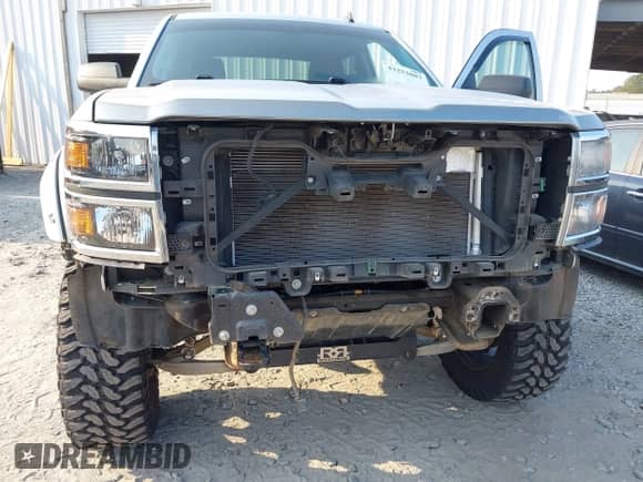 2014 Chevrolet Silverado 1500 LT z VIN 3GCUKREC7EG327758, wystawiony jako IAAI lot #43253807 z przebiegiem 103 699 mil mil oraz . Historia ofert i sprzedaży dostępna na DreamBid. Obrazek 6.