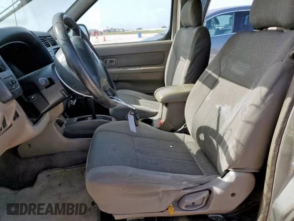 2001 Nissan Frontier XE with VIN 1N6ED27T51C357872, listed as a Copart auction lot 64646255 with 364,415 mi miles and Salvage title. Bid and sale history available at DreamBid. Image 7.