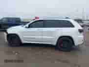 2016 Jeep Grand Cherokee SRT with VIN 1C4RJFDJ0GC456325, listed as a IAAI auction lot 41425211 with 159,746 mi miles and . Bid and sale history available at DreamBid. Image 14.