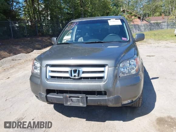 2007 Honda Pilot EX with VIN 2HKYF184X7H500209, listed as a IAAI auction lot 43201517 with 77,309 mi miles and . Bid and sale history available at DreamBid. Image 13.