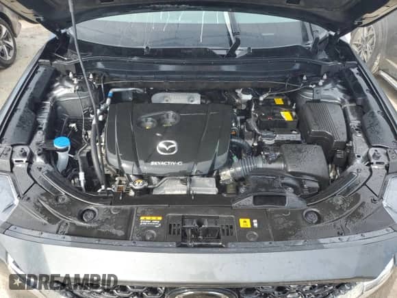 2024 Mazda CX-5 S Carbon Edition z VIN JM3KFBCL3R0415360, wystawiony jako Copart lot #74903154 z przebiegiem Nie podano mil oraz Nie do naprawy • Non repairable. Historia ofert i sprzedaży dostępna na DreamBid. Obrazek 12.