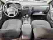 2003 Jeep Grand Cherokee Laredo with VIN 1J4GW48N03C570923, listed as a Copart auction lot 82103275 with 151,784 mi miles and Clean title. Bid and sale history available at DreamBid. Image 8.