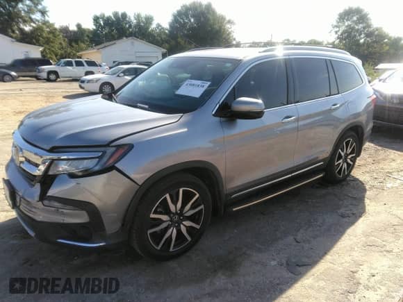 2021 Honda Pilot Touring 7-Passenger with VIN 5FNYF5H69MB000710, listed as a IAAI auction lot 43081838 with 91,899 mi miles and . Bid and sale history available at DreamBid. Image 17.
