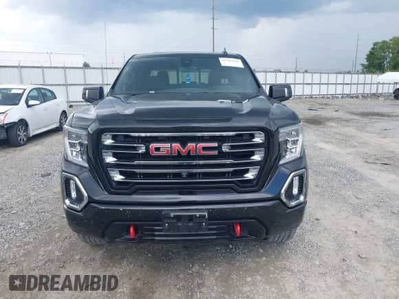 2021 GMC Sierra 1500 AT4 z VIN 3GTP9EEL5MG187421, wystawiony jako IAAI lot #42707618 z przebiegiem 60 936 mil mil oraz . Historia ofert i sprzedaży dostępna na DreamBid. Obrazek 12.
