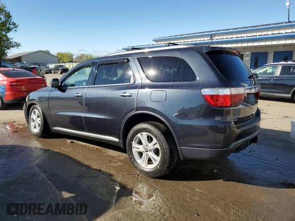 2013 Dodge Durango Crew with VIN 1C4SDJDT5DC652415, listed as a Copart auction lot 81213345 with 160,490 mi miles and Salvage title. Bid and sale history available at DreamBid. Image 2.