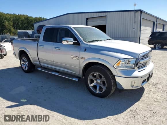 2014 Ram 1500 Laramie с VIN 1C6RR7JT1ES266497, выставлен на аукционе Copart как лот 84878445 с пробегом 95 194 миль миль и Списание • Salvage title. История ставок и продаж доступна на DreamBid. Изображение 4.