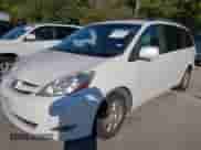 2009 Toyota Sienna XLE with VIN 5TDZK22CX9S232491, listed as a IAAI auction lot 43389674 with 298,733 mi miles and . Bid and sale history available at DreamBid. Image 6.