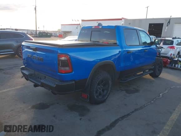 2024 Ram 1500 Rebel z VIN 1C6SRFLT9RN165687, wystawiony jako IAAI lot #41182485 z przebiegiem 4 211 mil mil oraz . Historia ofert i sprzedaży dostępna na DreamBid. Obrazek 4.