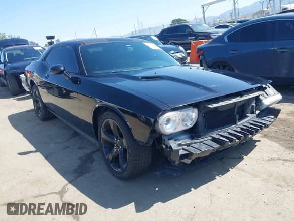 2014 Dodge Challenger R/T с VIN 2C3CDYBT8EH280622, выставлен на аукционе IAAI как лот 41973994 с пробегом 86 983 миль миль и . История ставок и продаж доступна на DreamBid. Изображение 1.