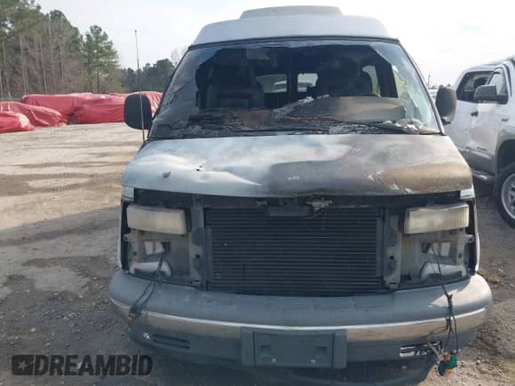 1996 Chevrolet Chevy Van with VIN 1GBFG15RXT1019130, listed as a IAAI auction lot 41674417 with Not provided miles and . Bid and sale history available at DreamBid. Image 6.