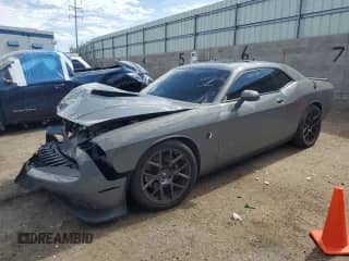 2017 Dodge Challenger 392 Hemi Scat Pack Shaker с VIN 2C3CDZFJ0HH640999, выставлен на аукционе Copart как лот 66958285 с пробегом 69 036 миль миль и Списание • Salvage title. История ставок и продаж доступна на DreamBid. Изображение 1.
