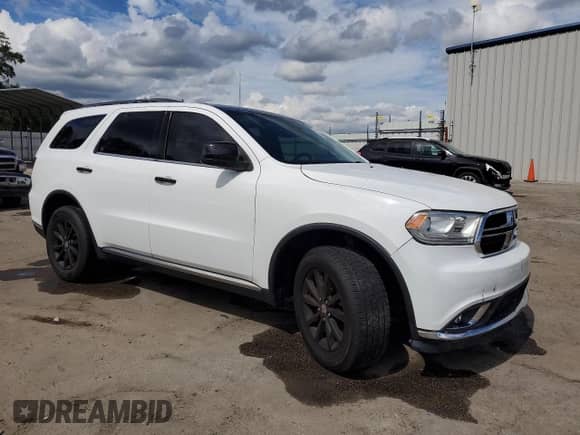 2018 Dodge Durango SXT with VIN 1C4RDJAG4JC291633, listed as a Copart auction lot 84258585 with 124,014 mi miles and Salvage title. Bid and sale history available at DreamBid. Image 4.
