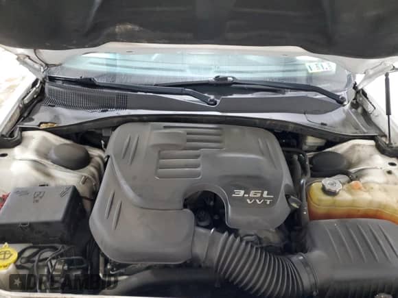 2014 Chrysler 300 z VIN 2C3CCARG9EH352978, wystawiony jako Copart lot #86805045 z przebiegiem 62 940 mil mil oraz Szkoda całkowita • Salvage title. Historia ofert i sprzedaży dostępna na DreamBid. Obrazek 11.