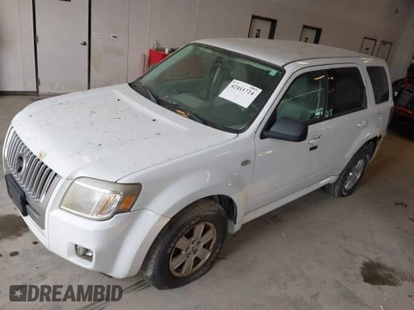 2008 Mercury Mariner with VIN 4M2CU91158KJ33778, listed as a IAAI auction lot 42411724 with 168,359 mi miles and . Bid and sale history available at DreamBid. Image 2.