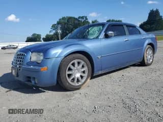 2007 Chrysler 300 C with VIN 2C3LA63H67H676154, listed as a Copart auction lot 57853625 with 179,563 mi miles and Salvage title. Bid and sale history available at DreamBid. Image 1.