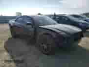 2013 Dodge Charger SRT-8 Super Bee with VIN 2C3CDXGJ7DH552318, listed as a Copart auction lot 87907595 with 79,630 mi miles and Salvage title. Bid and sale history available at DreamBid. Image 4.