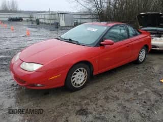 2002 Saturn SC with VIN 1G8ZY12752Z308435, listed as a Copart auction lot 85364214 with 112,649 mi miles and Clean title. Bid and sale history available at DreamBid. Image 1.