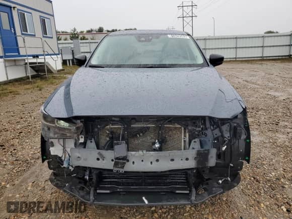 2025 Mazda CX-5 S Carbon Edition z VIN JM3KFBCMXS0683398, wystawiony jako Copart lot #81329585 z przebiegiem 6 041 mil mil oraz Czysty tytuł • Clean title. Historia ofert i sprzedaży dostępna na DreamBid. Obrazek 5.