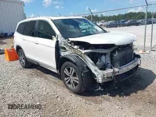 2016 Honda Pilot EX-L with VIN 5FNYF5H51GB036662, listed as a IAAI auction lot 43271267 with 142,010 mi miles and . Bid and sale history available at DreamBid. Image 1.