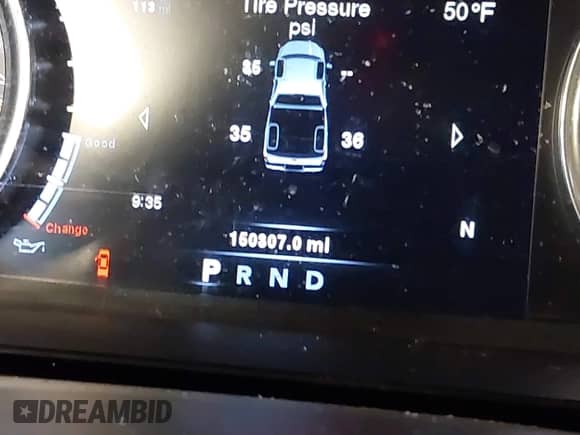 2014 Ram 1500 Laramie z VIN 1C6RR7NM2ES476528, wystawiony jako IAAI lot #42309574 z przebiegiem 150 307 mil mil oraz . Historia ofert i sprzedaży dostępna na DreamBid. Obrazek 15.