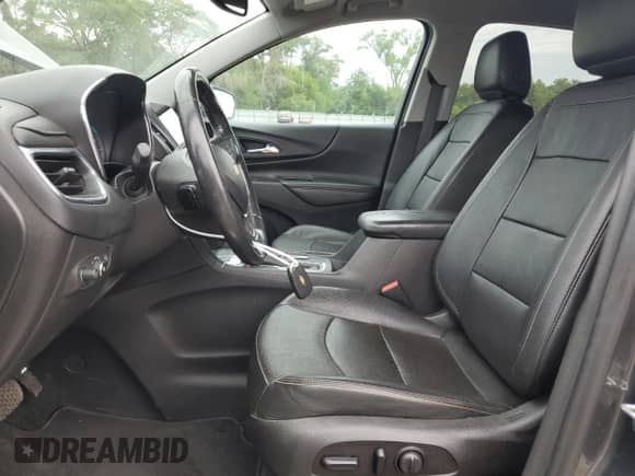 2020 Chevrolet Equinox Premier z VIN 3GNAXYEX9LS591373, wystawiony jako Copart lot #68774475 z przebiegiem 148 907 mil mil oraz Szkoda całkowita • Salvage title. Historia ofert i sprzedaży dostępna na DreamBid. Obrazek 7.