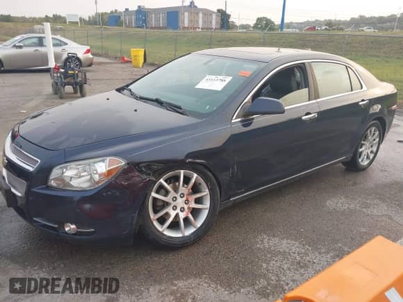 2012 Chevrolet Malibu LTZ 1LZ z VIN 1G1ZE5E08CF264561, wystawiony jako IAAI lot #43153788 z przebiegiem 160 864 mil mil oraz . Historia ofert i sprzedaży dostępna na DreamBid. Obrazek 17.