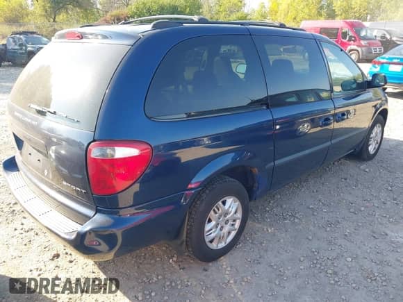 2002 Dodge Caravan Sport with VIN 1B4GP44302B619420, listed as a IAAI auction lot 43230695 with 75,410 mi miles and . Bid and sale history available at DreamBid. Image 4.