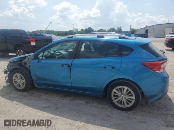 2018 Subaru Impreza Premium with VIN 4S3GTAD67J3708207, listed as a Copart auction lot 67976385 with 98,847 mi miles and Salvage title. Bid and sale history available at DreamBid. Image 2.
