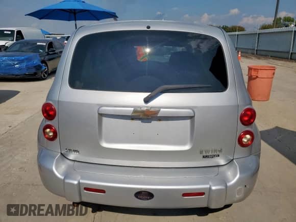 2010 Chevrolet HHR LS with VIN 3GNBAADB2AS505336, listed as a Copart auction lot 71270535 with 128,208 mi miles and Salvage title. Bid and sale history available at DreamBid. Image 6.