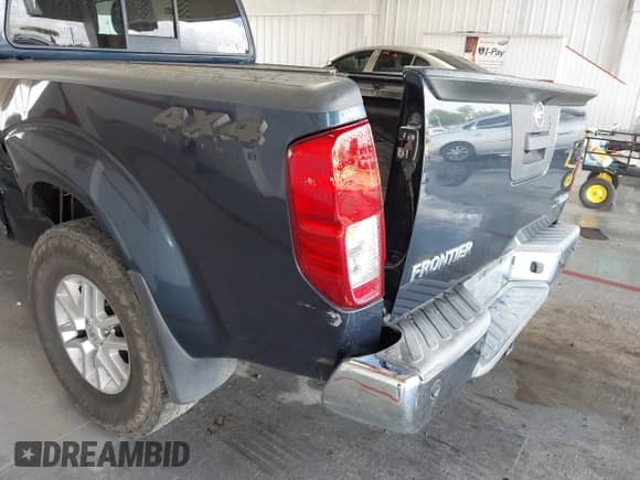 2015 Nissan Frontier SV with VIN 1N6AD0FV1FN742136, listed as a IAAI auction lot 43330683 with 130,630 mi miles and . Bid and sale history available at DreamBid. Image 6.