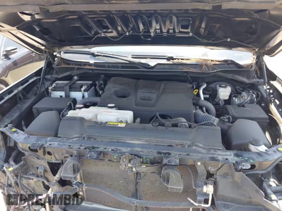 2022 Toyota Tundra SR with VIN 5TFKB5AB7NX017988, listed as a IAAI auction lot 42986871 with 50,437 mi miles and . Bid and sale history available at DreamBid. Image 10.