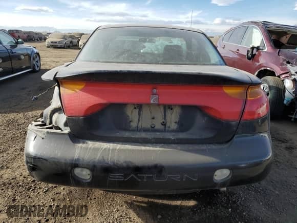 2002 Saturn SC с VIN 1G8ZY14702Z107166, выставлен на аукционе Copart как лот 87435474 с пробегом 178 319 миль миль и Списание • Salvage title. История ставок и продаж доступна на DreamBid. Изображение 6.