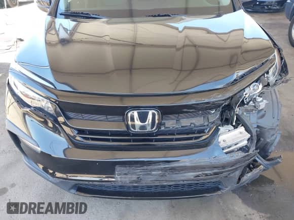 2021 Honda Pilot Special Edition z VIN 5FNYF5H27MB045707, wystawiony jako IAAI lot #43023503 z przebiegiem 70 400 mil mil oraz . Historia ofert i sprzedaży dostępna na DreamBid. Obrazek 17.