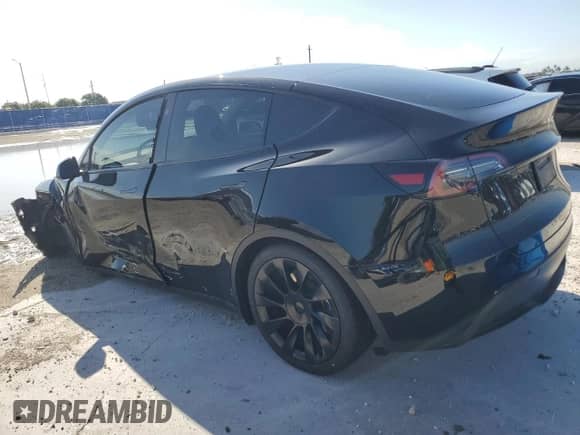 2024 Tesla Model Y с VIN 7SAYGDED9RF089599, выставлен на аукционе Copart как лот 84059915 с пробегом 32 641 миль миль и Списание • Salvage title. История ставок и продаж доступна на DreamBid. Изображение 2.