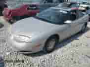 2001 Saturn SC with VIN 1G8ZR12711Z109068, listed as a Copart auction lot 72353914 with 116,559 mi miles and Salvage title. Bid and sale history available at DreamBid. Image 1.