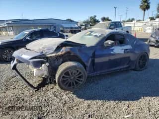 2016 Scion FR-S with VIN JF1ZNAA11G8703131, listed as a Copart auction lot 84044295 with 57,731 mi miles and Salvage title. Bid and sale history available at DreamBid. Image 1.