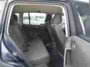 2013 Volkswagen Tiguan SE z VIN WVGAV3AX9DW613283, wystawiony jako IAAI lot #41954359 z przebiegiem 147 525 mil mil oraz . Historia ofert i sprzedaży dostępna na DreamBid. Obrazek 8.