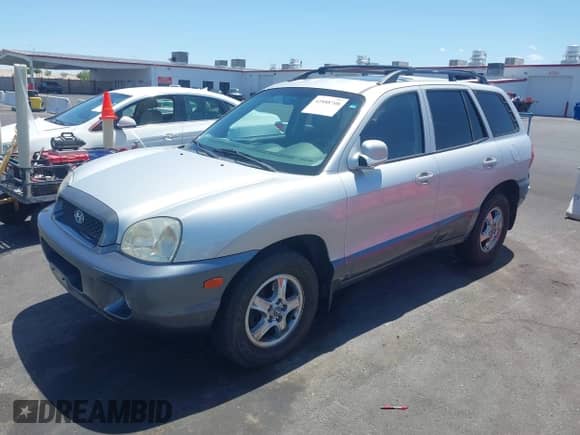 2004 Hyundai Santa Fe GLS with VIN KM8SC13E24U692561, listed as a IAAI auction lot 42888708 with 144,822 mi miles and . Bid and sale history available at DreamBid. Image 12.