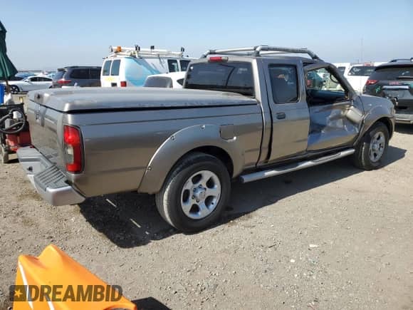 2004 Nissan Frontier XE z VIN 1N6ED29X64C430767, wystawiony jako Copart lot #62191075 z przebiegiem 110 110 mil mil oraz Szkoda całkowita • Salvage title. Historia ofert i sprzedaży dostępna na DreamBid. Obrazek 3.